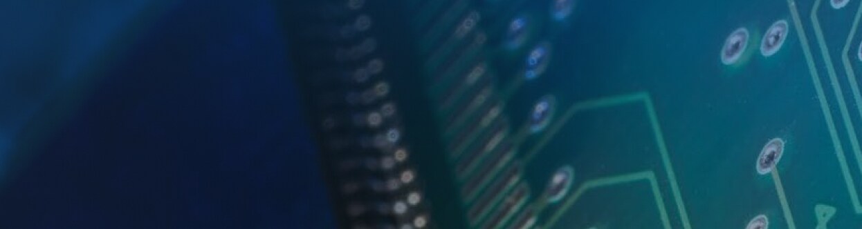 Close-up of a silicon chip, overlaid with a blue gradient